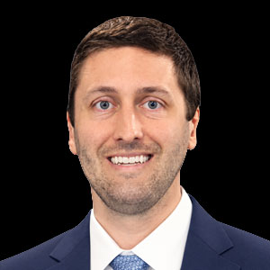 Professional headshot of Dr. Spencer Moore, MD, PhD.