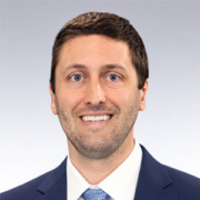 Professional headshot of Dr. Spencer Moore, MD, PhD.